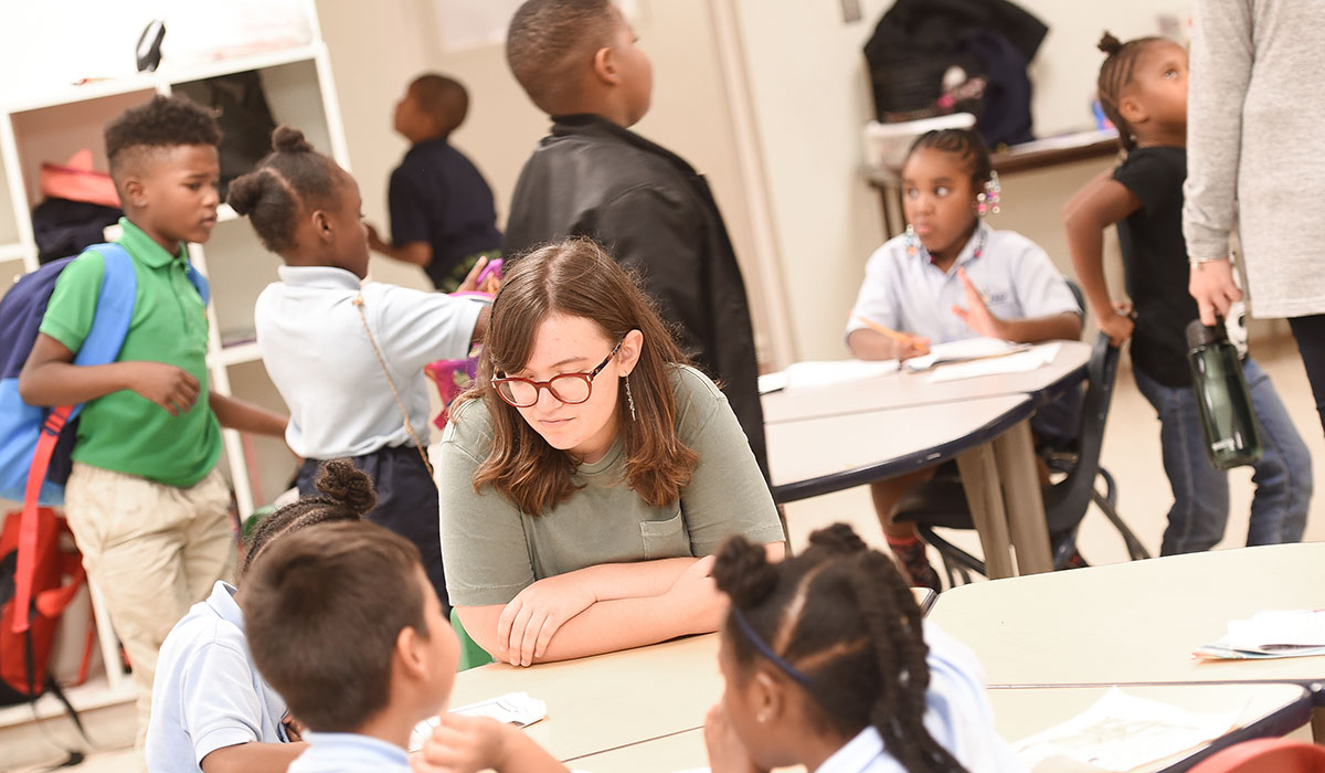 Catholic University students tutoring